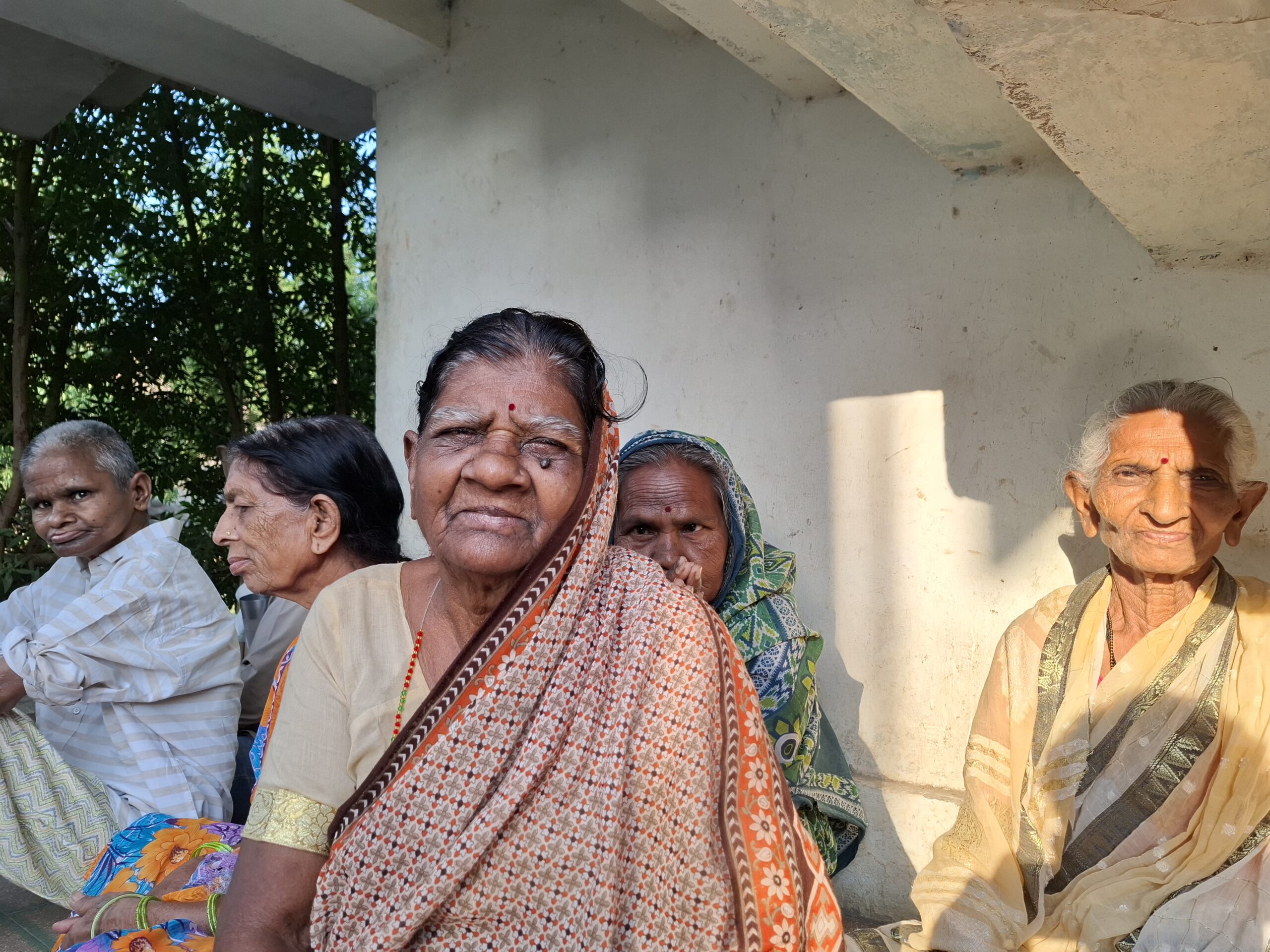 Volunteers with elderly residents